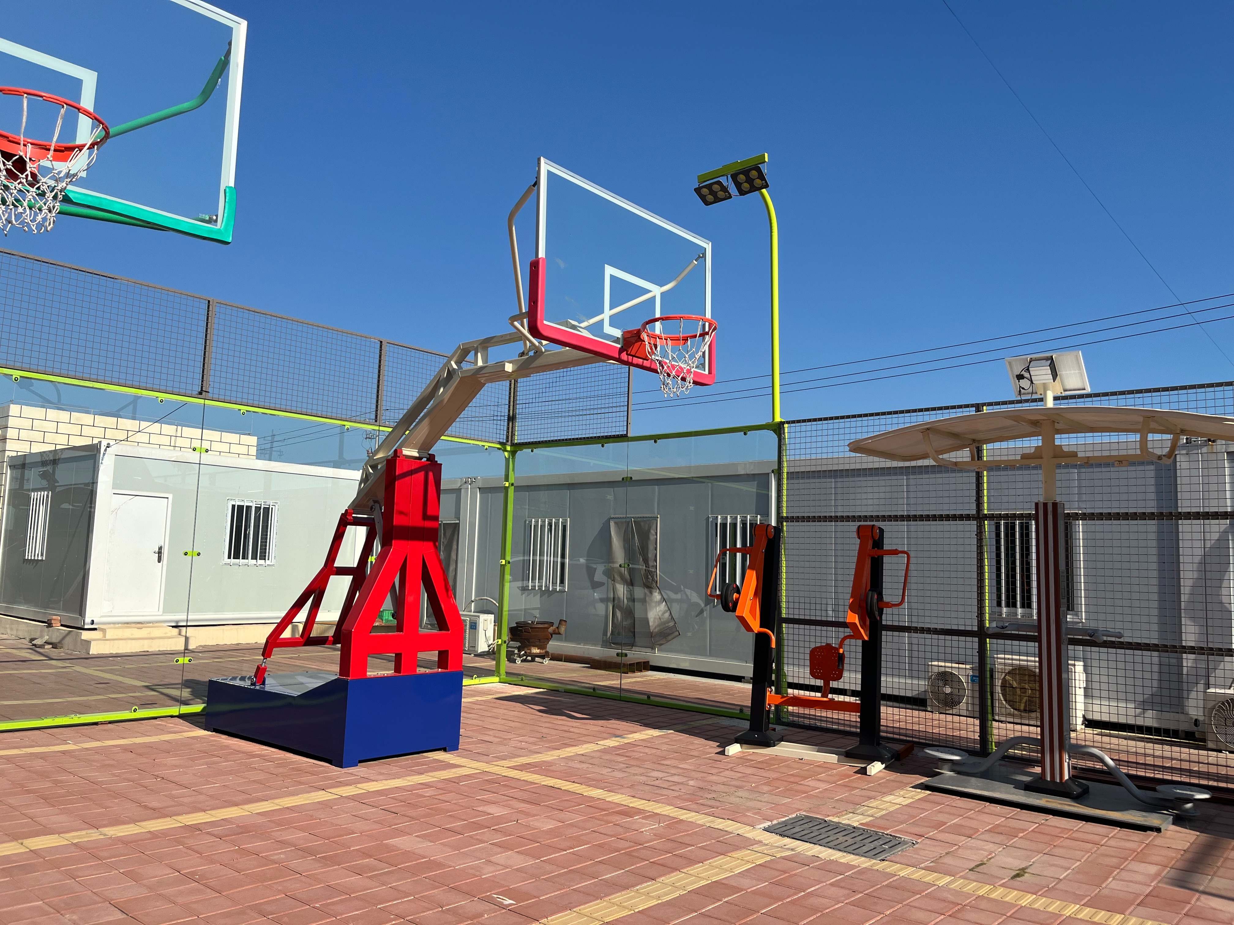 Basketball stand outdoors under sunlight with anti-UV coating detail
