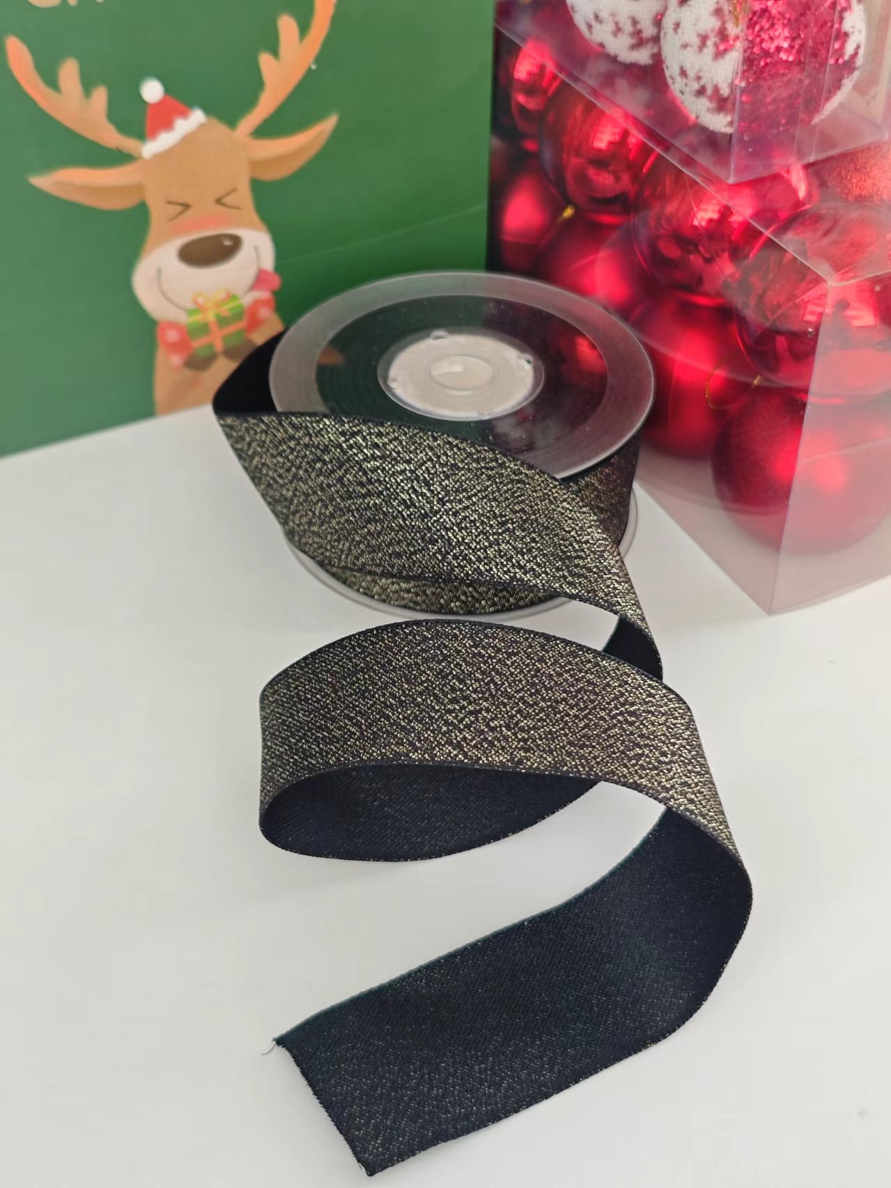 Item No. : 1273 Christmas Gift Packaging Decoration DIY Black Gold Scallion Shiny Christmas Webbing 3.8cm Application Scenario
