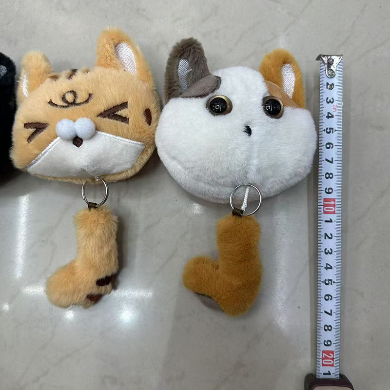 Tail-pulling cat animal plush toys, creative dolls, cartoon accessories, plush figurines, keychains, cloth dolls, cute decorative gifts, claw machine factory direct sales Application Scenario