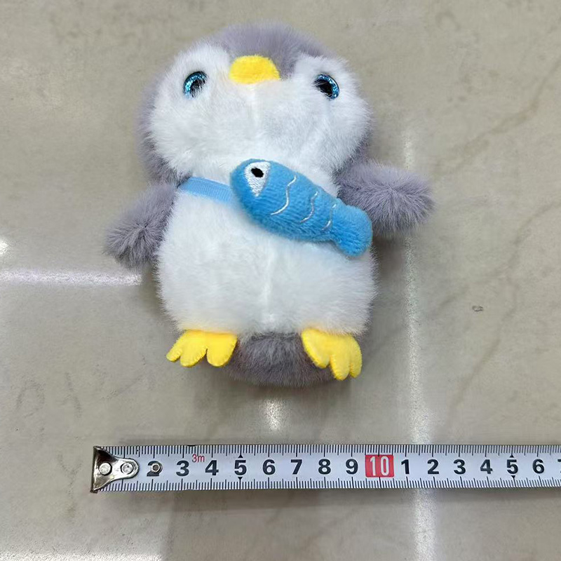 Fish-Hugging Penguin Plush Toys, Cultural And Creative Souvenirs, Animal Creative Dolls, Cartoon Peripheral Pendants, Plush Toy Pendants, Keychains, Cloth Doll Pendants, Cute Decorative Gifts, Claw Machine Factory Direct Sales Application Scenario