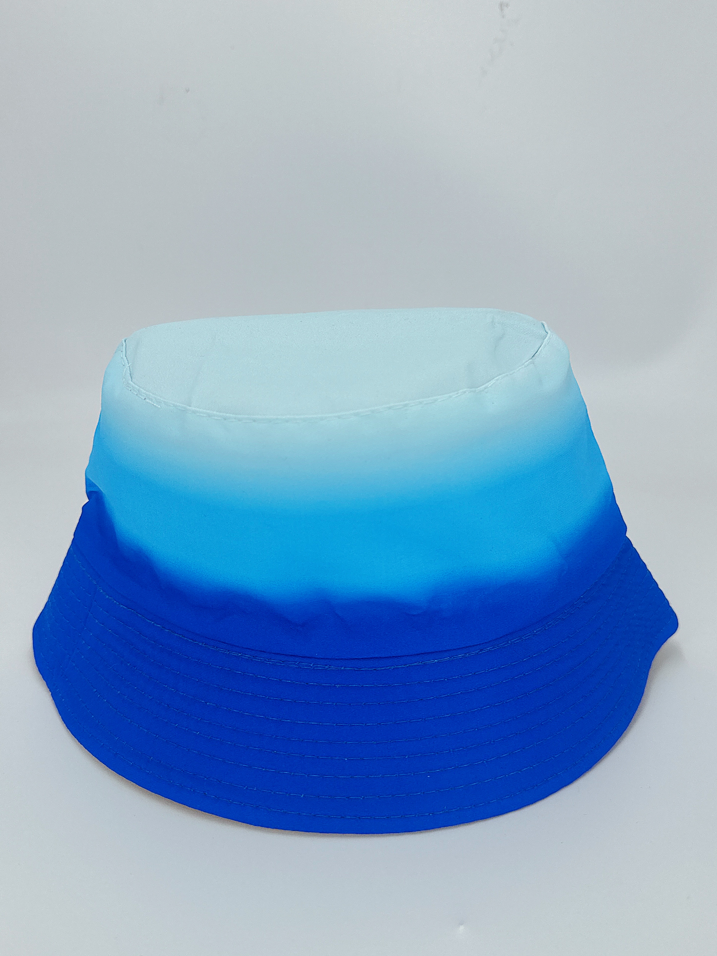 New spring and summer rainbow print gradient double-sided fisherman's hat, cute cartoon, versatile, outdoor sun protection, foldable, easy to carry, unisex, pier circumference 54CM fisherman's hat Application Scenario