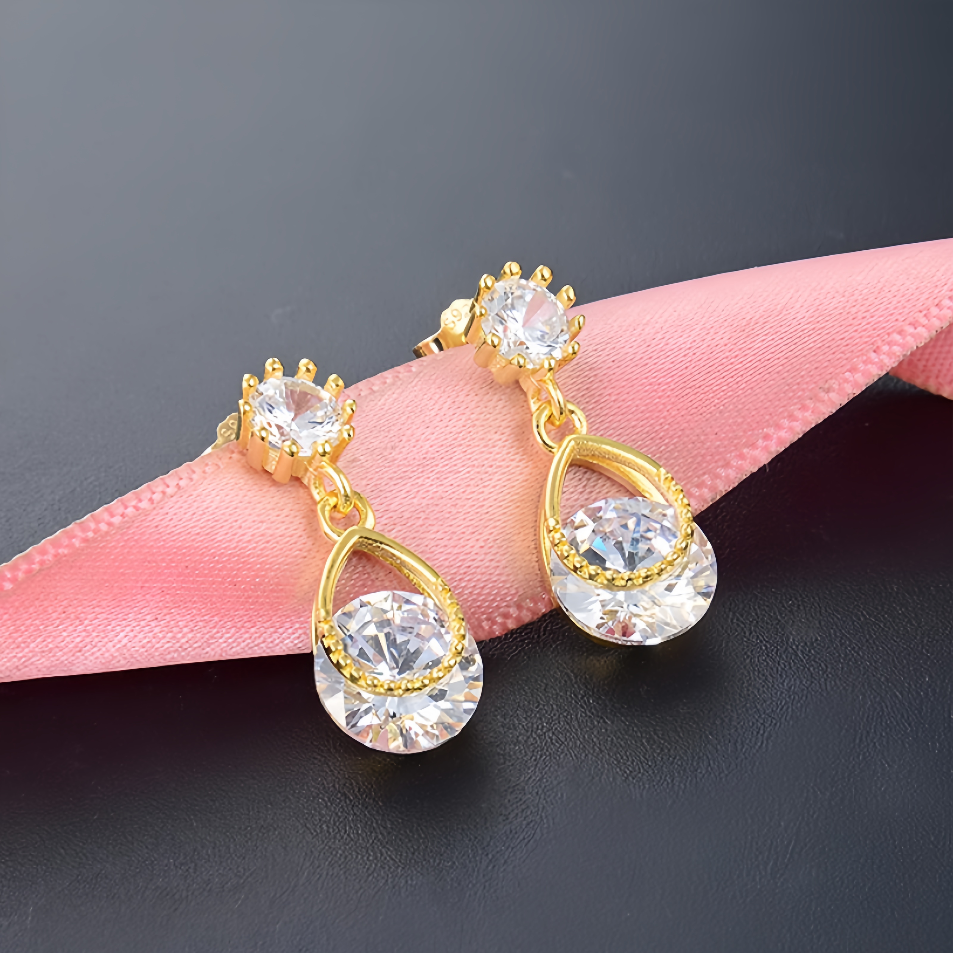 Xuhui brand exquisite and light luxury copper plated with real gold and set with zircon 925 silver needle water drop design fashionable stud earrings Item Picture