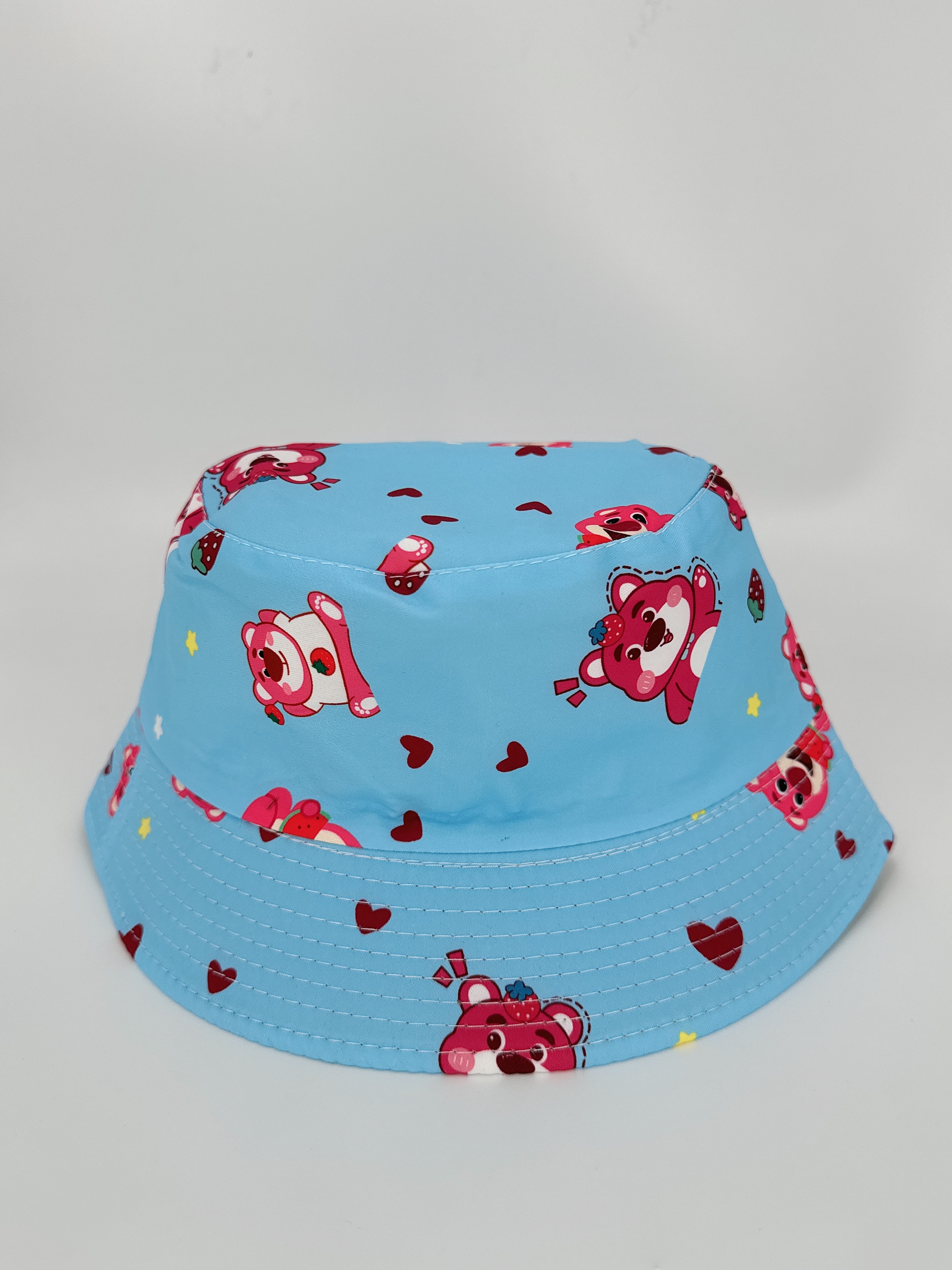 The new strawberry Bear double-sided fisherman's hat for spring and summer is cute, cartoon and versatile. It can be folded for outdoor sun protection and easy to carry. It is suitable for both men and women, with a dock circumference of 54CM Specification drawing