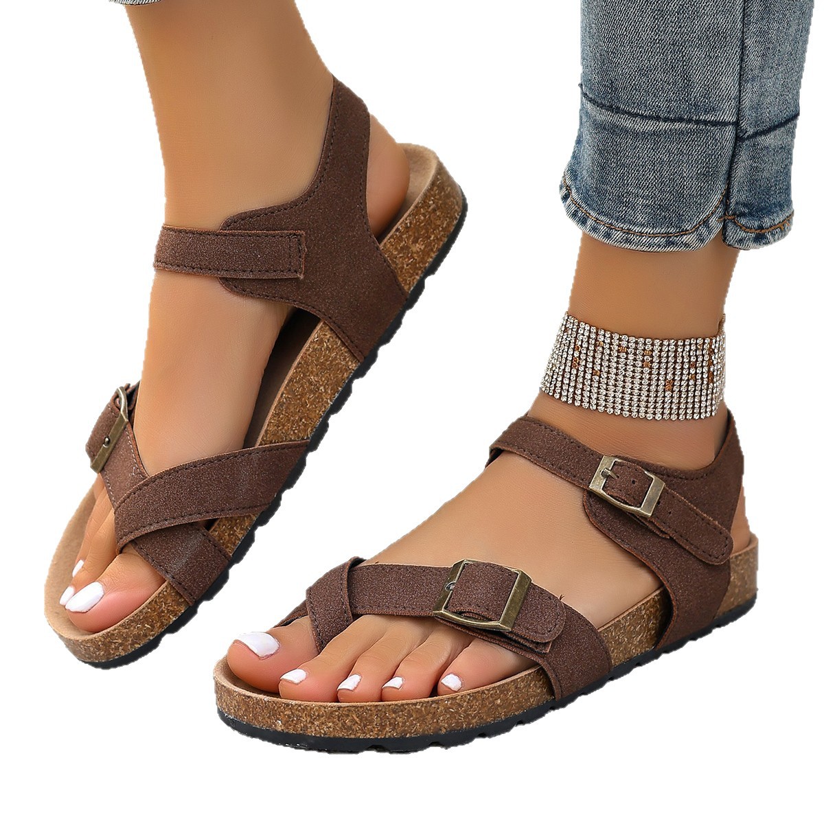 This is a fashionable beach shoe for women to wear outside in summer, with flat heels, cork soles and metal sandals. It has buckles that expose the toes and is cool Item Picture