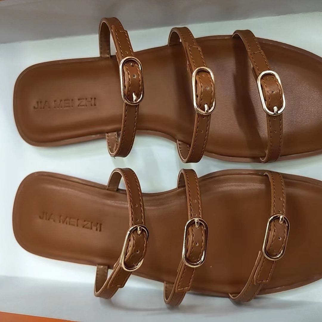 The M D brand women's shoes feature a one-strap slipper and a metal-clasp flat, open-toe, three-strap decorated sandal with a comfortable flat surface Item Picture