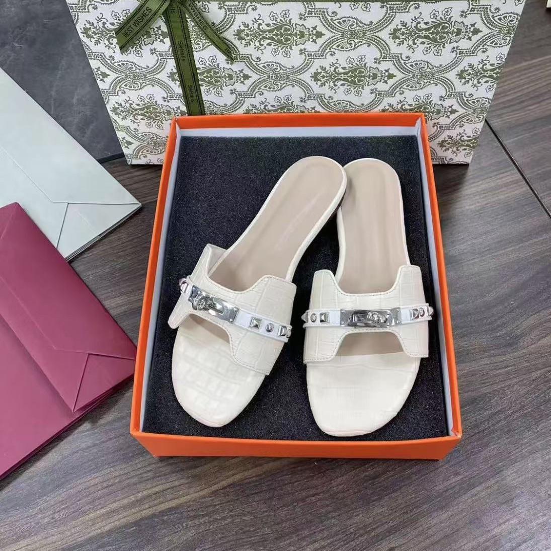 2025 Korean Summer New Style fashionable metal buckle riveted flat slippers, elegant toe-exposing outerwear cool slippers for women Application Scenario