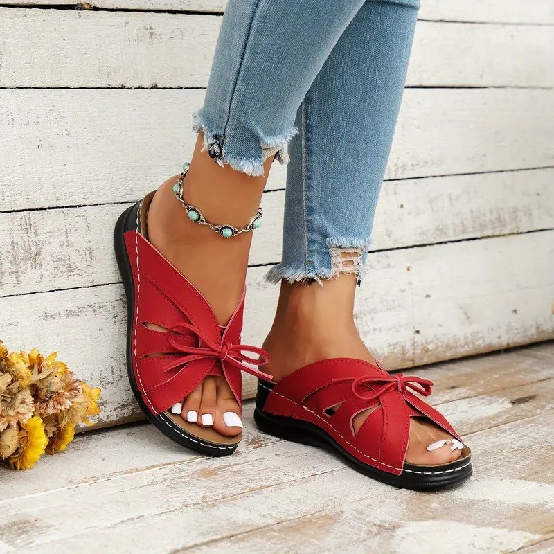 Cross-border trade large-sized bow wedge heel flat sandals 2025 new solid color fish-mouth hollowed-out hole shoes details Picture