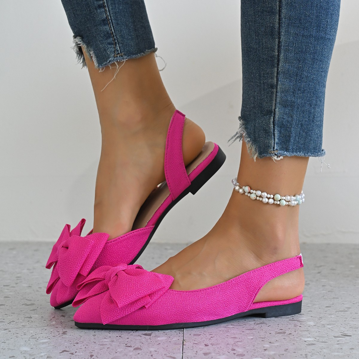 2025 Summer new style European and American plus-size bow solid color pointed-toe shallow toe flat women's shoes plus-size sandals full figure