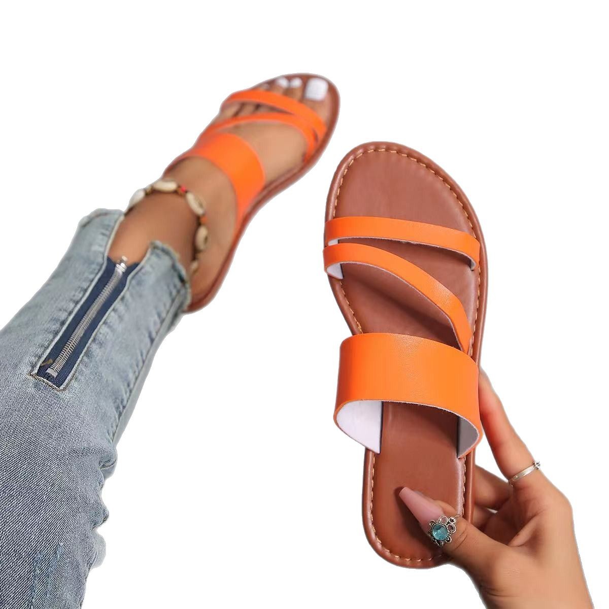 The 2025 summer new flat slippers are versatile for women's outdoor wear. They are Roman-style beach fashion slippers with anti-slip properties for women Item Picture