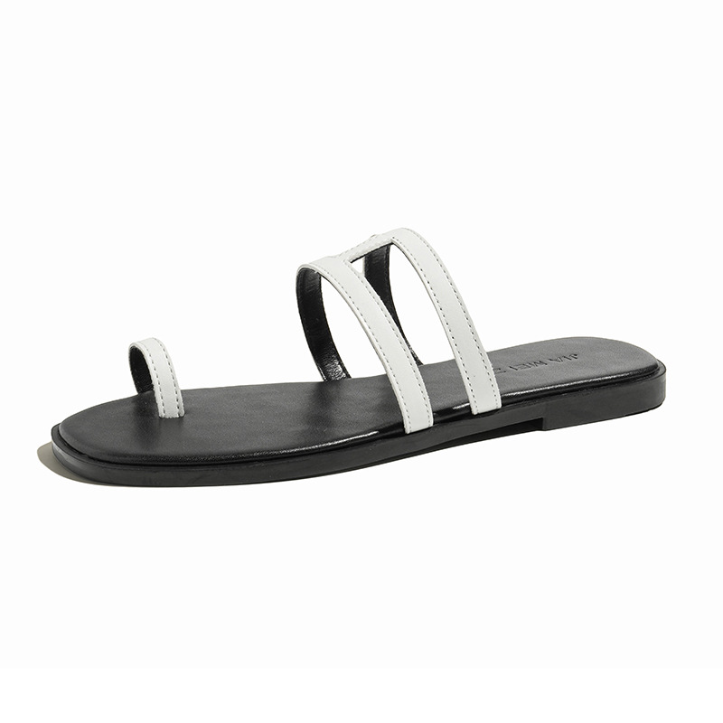 This is a trendy and simple leather flip-flop for women to wear outside in summer. It is a flat-bottomed flip-flop and a French-style beach flip-flop Item Picture