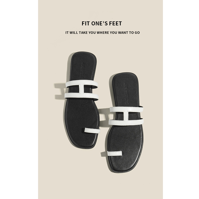 This is a trendy and simple leather flip-flop for women to wear outside in summer. It is a flat-bottomed flip-flop and a French-style beach flip-flop details Picture