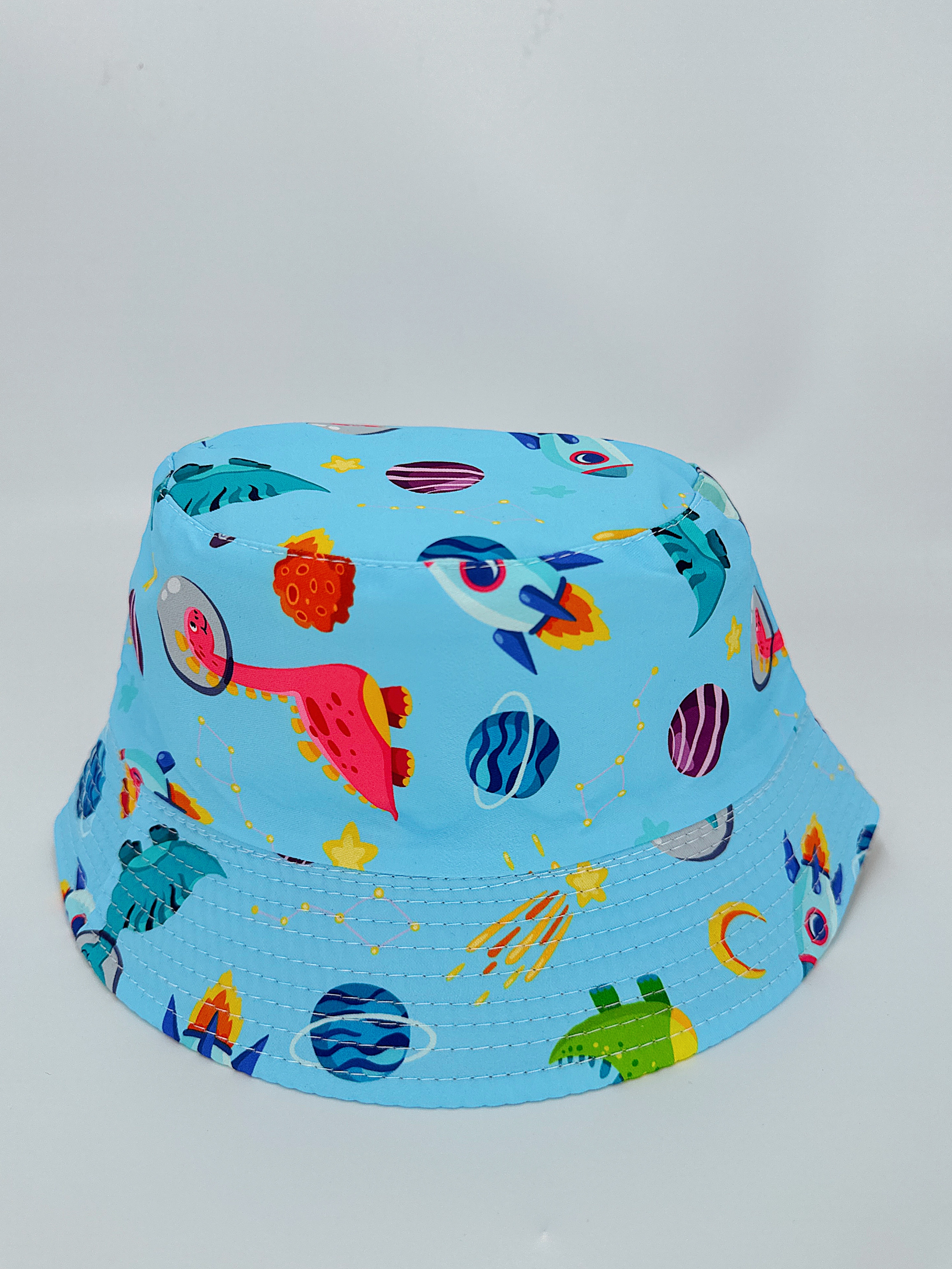Spring and summer new rocket dinosaur multi-print double-sided fisherman's hat, cute cartoon, versatile, outdoor sun protection and sun protection, foldable for easy carrying, unisply-style, pier circumference 54CM fisherman's hat Application Scenario