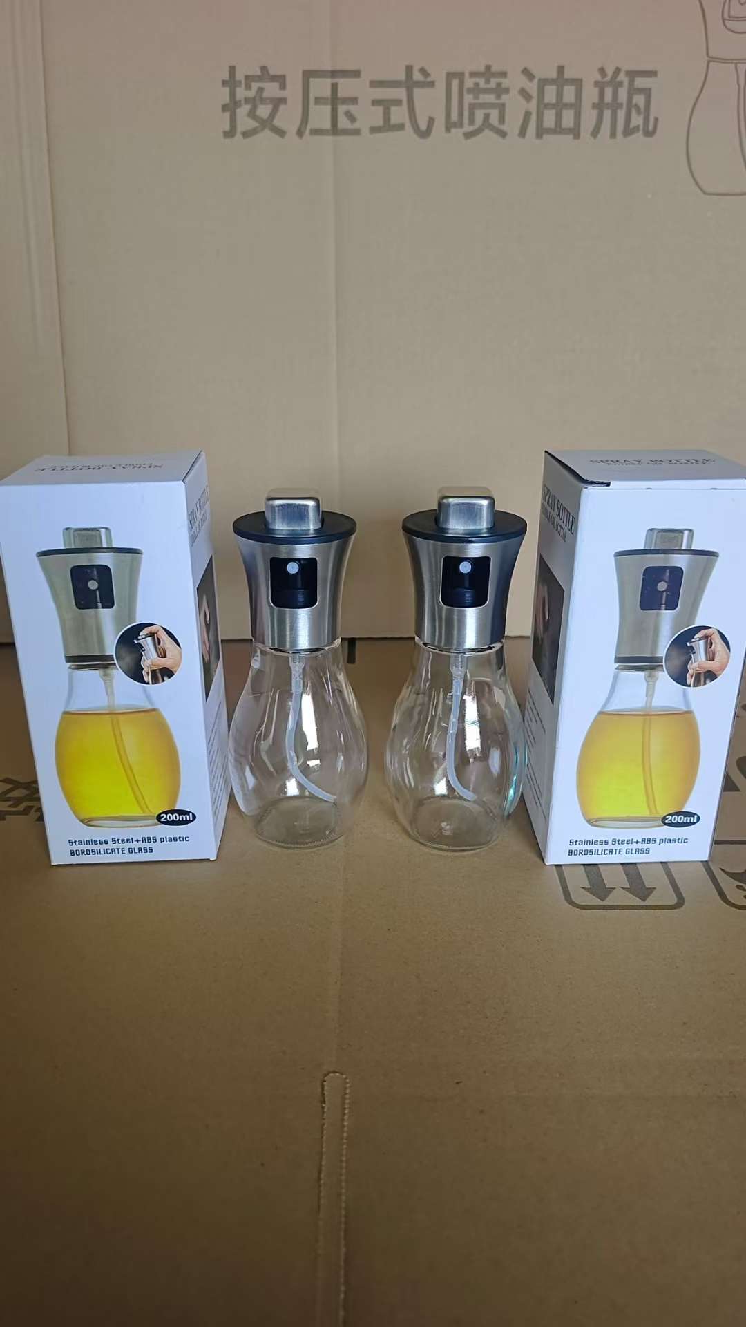 Household glass spray bottle, press-type spray oil pot, kitchen spray oil pot, stainless steel spray bottle, atomized spray oil pot, oil pot seasoning glass oil pot, oil pot seasoning bottle can, kitchen glass bottle Application Scenario