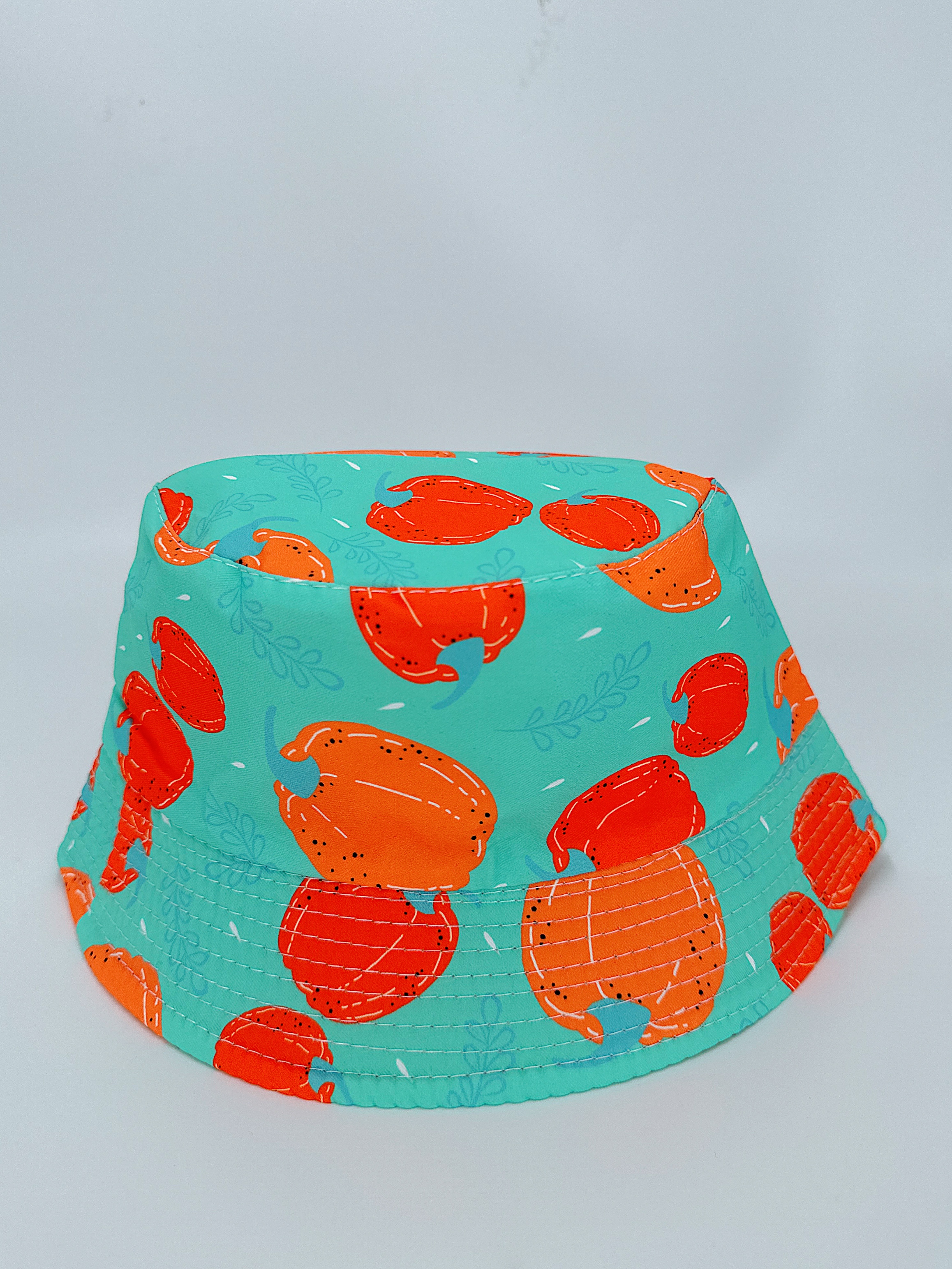 New spring and summer styles of small pumpkin with multiple prints, double-sided wearing fisherman's hat, cute cartoon, versatile, outdoor sun protection, foldable for easy carrying, unisplendable, pier circumference 54CM fisherman's hat Application Scenario