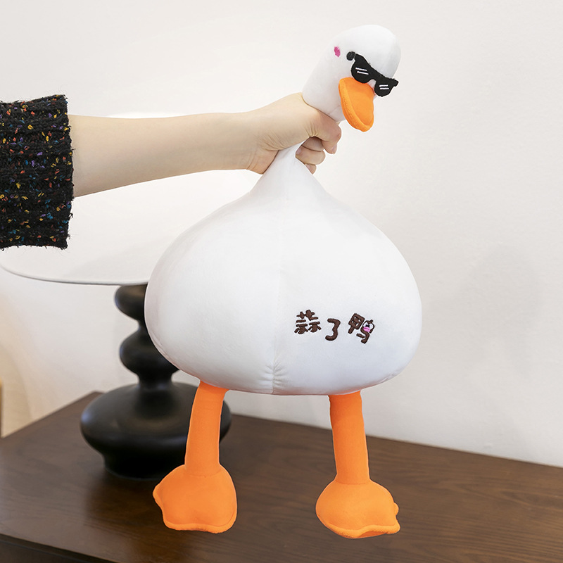 Wholesale of new cute garlic duck plush toys, creative figurines, gifts for people, living room ornaments and dolls details Picture