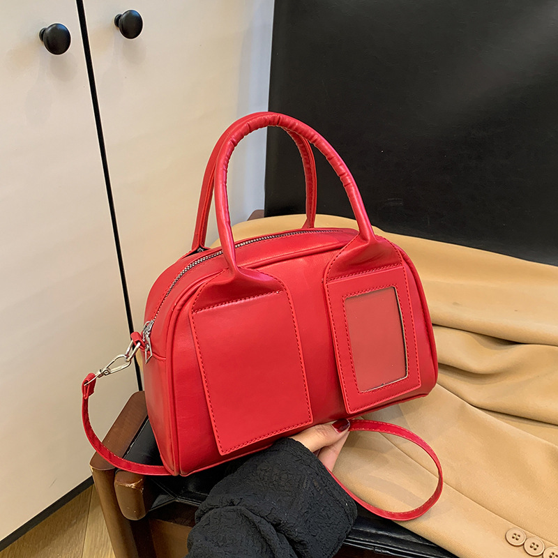 A new 2025 American retro hand-held bowling bag, a trendy, casual, high-end and elegant commuter crossbody bag for women details Picture