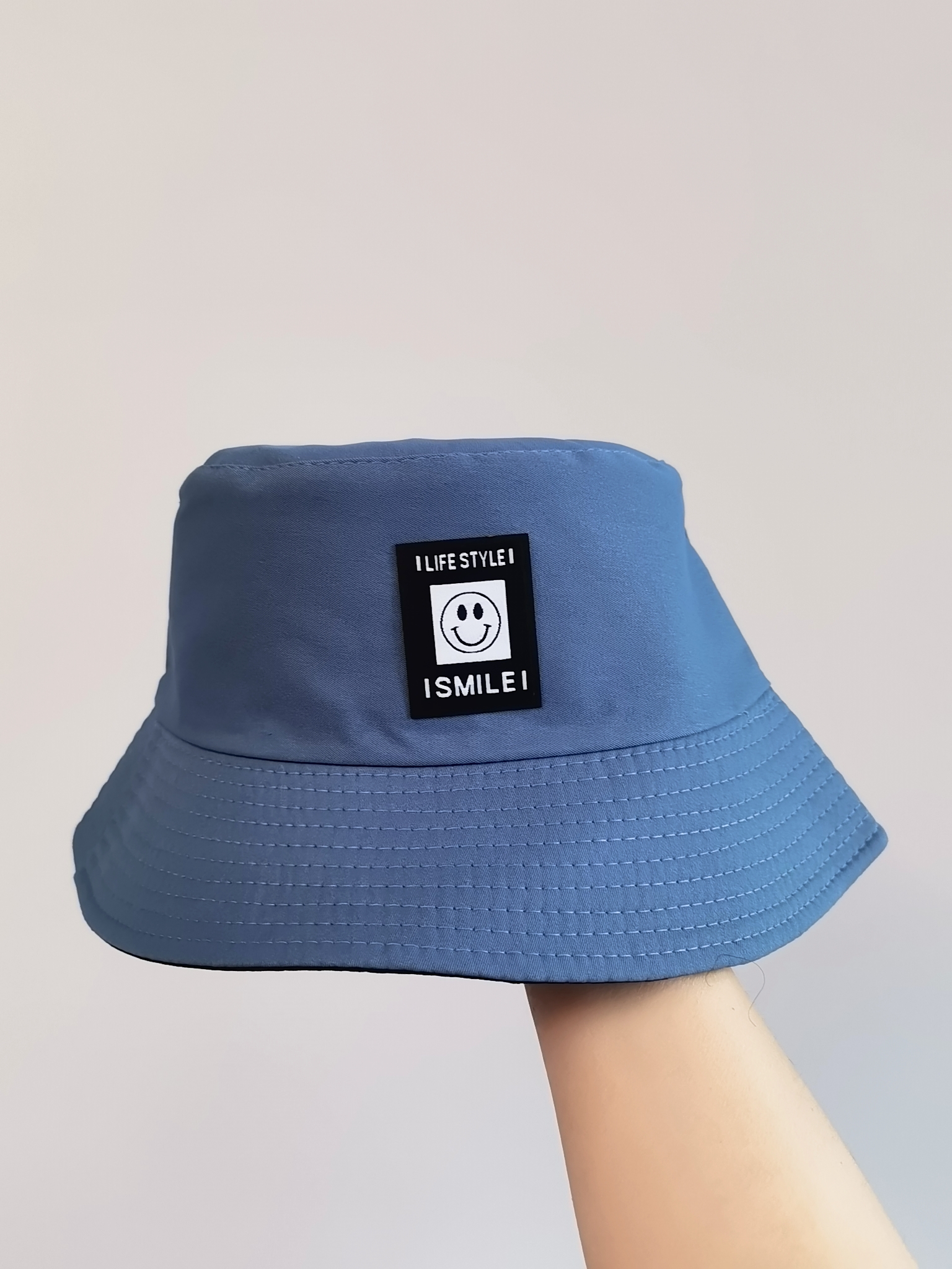 This spring and summer Korean bestseller features a smiling face emoji with the letters "ISMILEL". It can be worn on both sides as a fisherman's hat for sun protection and sun protection. It is simple, fashionable, versatile, foldable and easy to carry. It is suitable for both men and women, and is available in size 58 for adults Item Picture