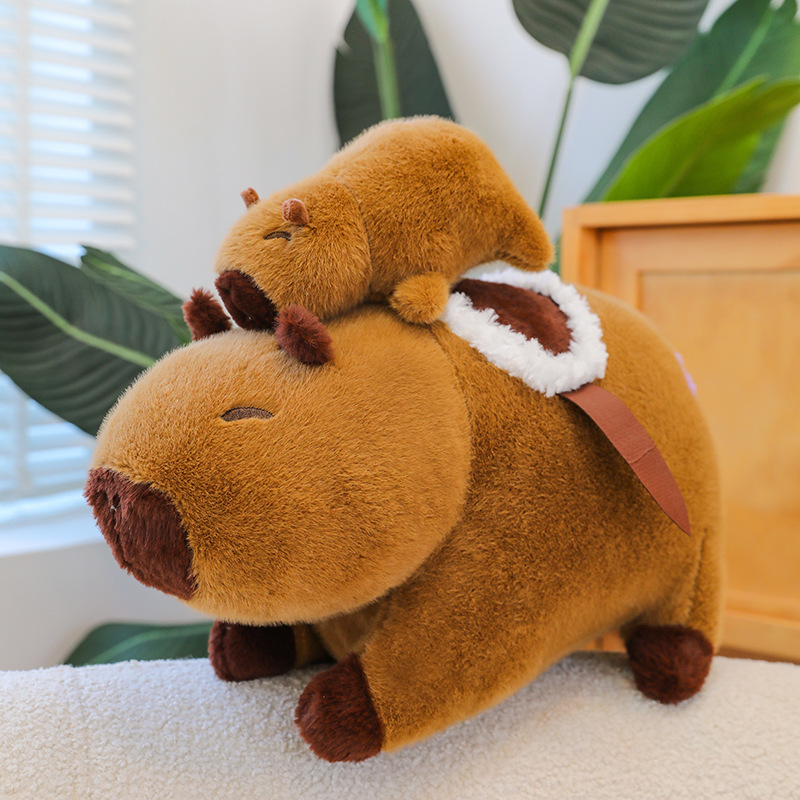 Purple butt ashore mother and child capybara dolls, drawstring Kapi Bara dolls, student graduation gifts, plush toys wholesale full figure