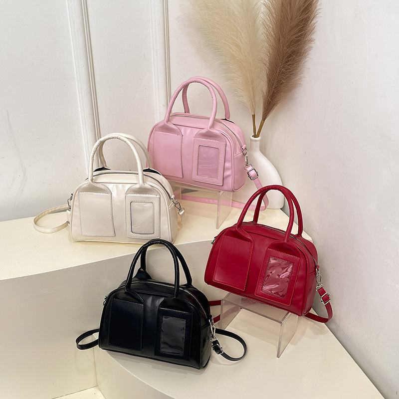A new 2025 American retro hand-held bowling bag, a trendy, casual, high-end and elegant commuter crossbody bag for women full figure