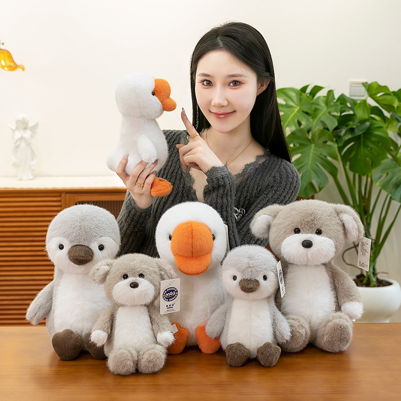 A new type of cute and realistic plush toy doll with a big head goose, a children's soothing sleeping pillow doll Application Scenario