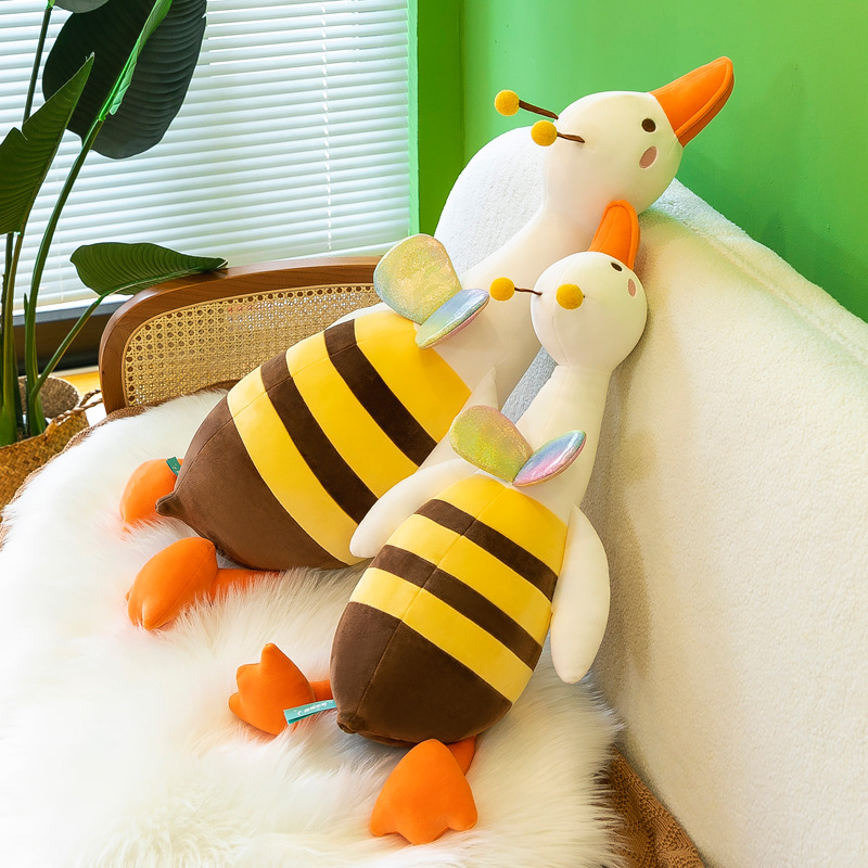 The new cross-border cute big white goose transforms into a bee plush toy bed companion doll as a gift for children and girls full figure