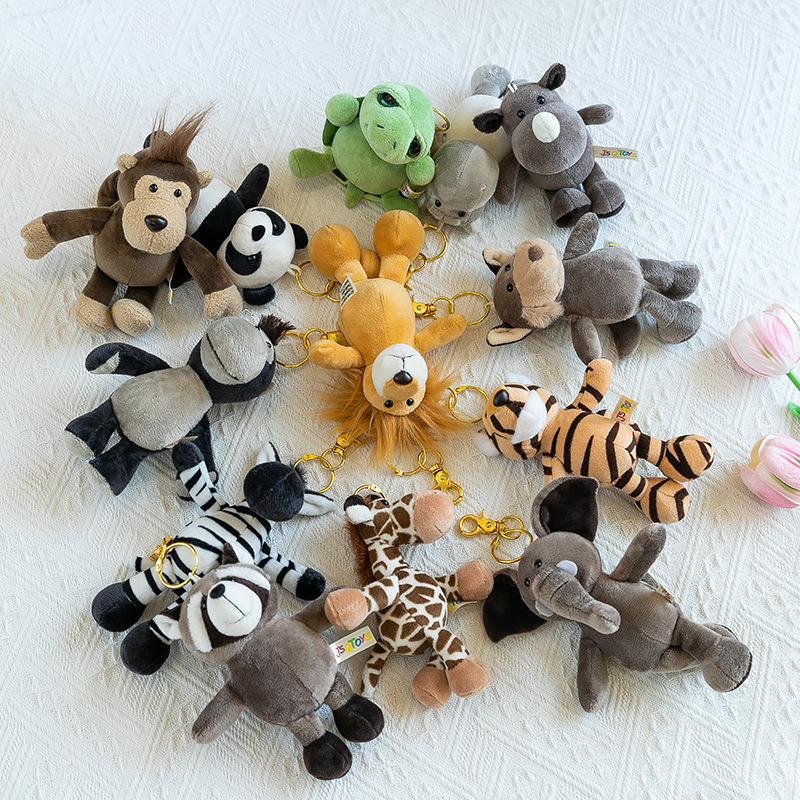 Wholesale of cartoon forest animal tiger figurines, plush lion trinkets, turtle dolls, keychains and 4-inch grabbers details Picture