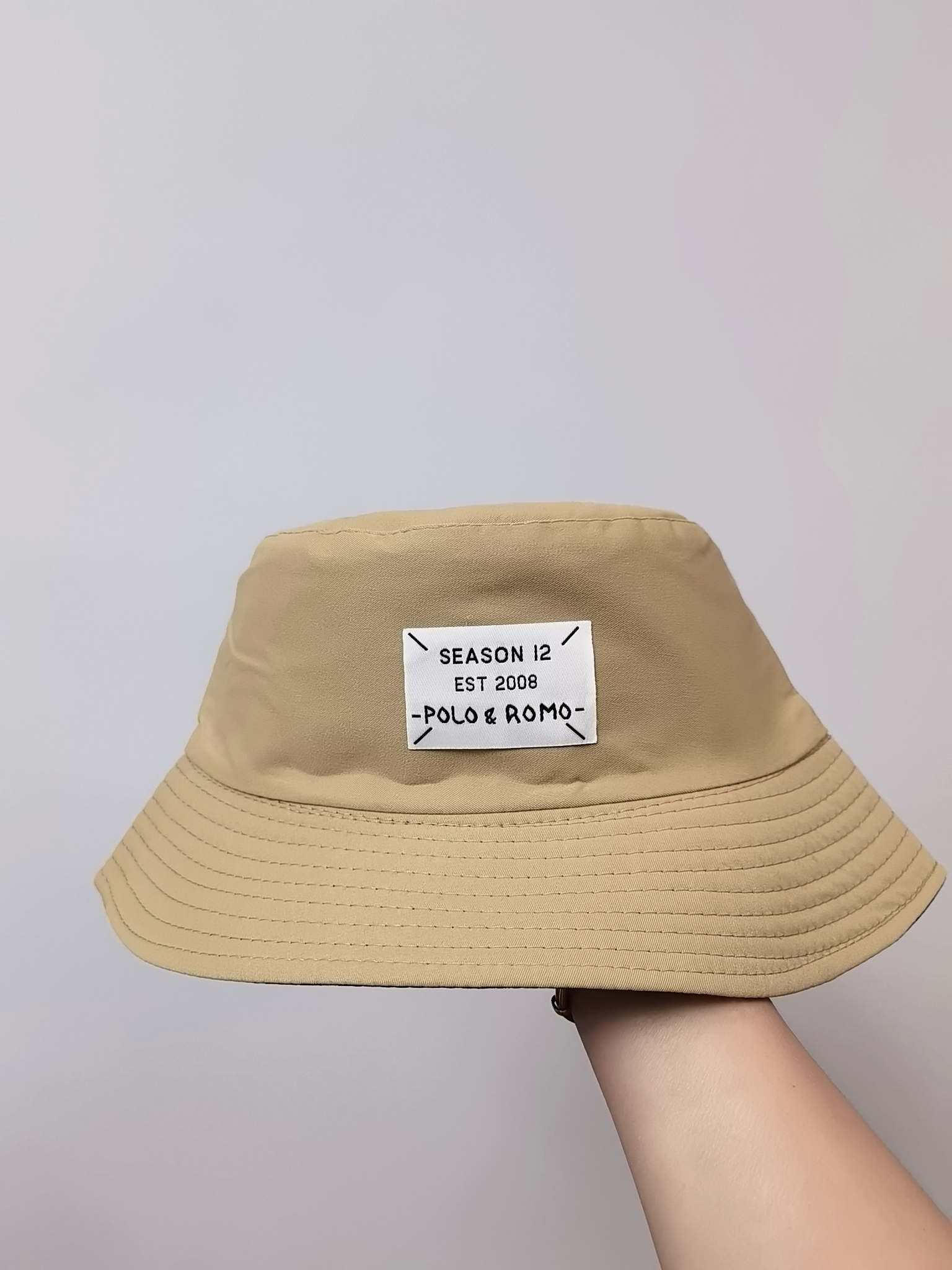 Spring and summer Korean bestsellers, alphanumeric logo, double-sided fisherman's hat for sun protection, simple, fashionable, versatile, foldable and easy to carry. Open to both men and women, adult cap size 58, head circumference, eight colors Application Scenario