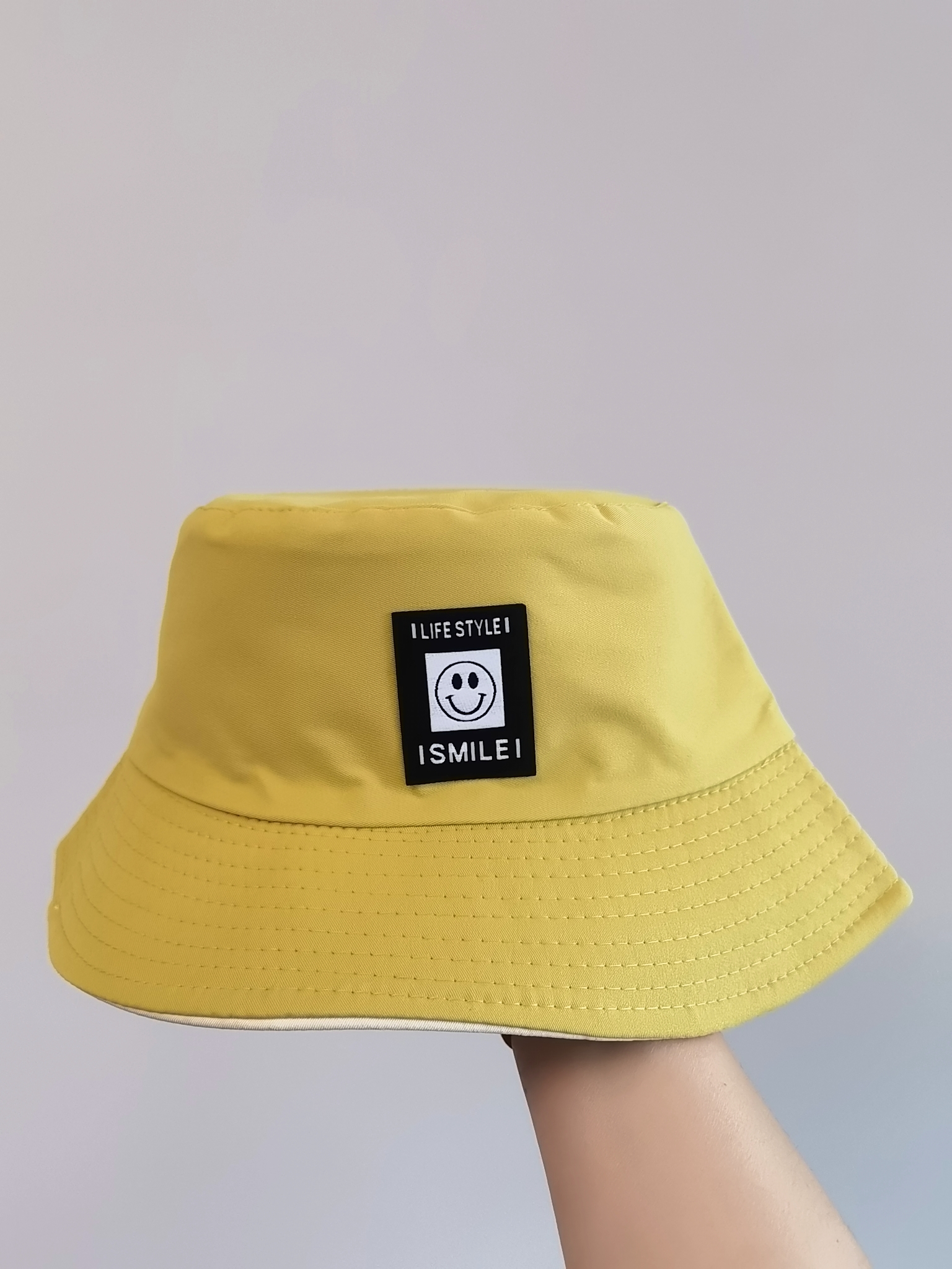 This spring and summer Korean bestseller features a smiling face emoji with the letters "ISMILEL". It can be worn on both sides as a fisherman's hat for sun protection and sun protection. It is simple, fashionable, versatile, foldable and easy to carry. It is suitable for both men and women, and is available in size 58 for adults Specification drawing