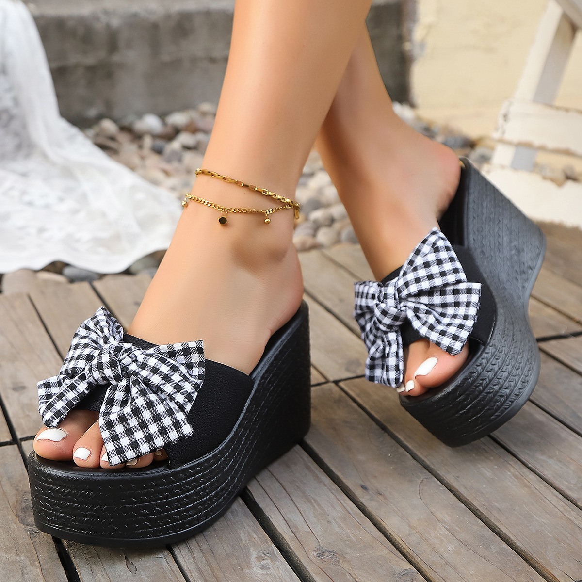 The 2025 new ultra-high heel one-shoulder women's anti-slip thick-soled beach shoes with a sweet bow and can be worn outside the slope full figure