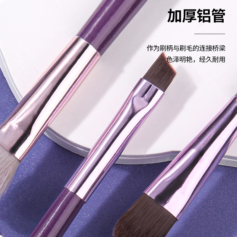 A set of 3 purple wooden-handled eye makeup brushes, including a soft-bristled eyeshadow brush, a smudging brush, a portable lip brush, and a "sleepy eye" refreshing style Specification drawing