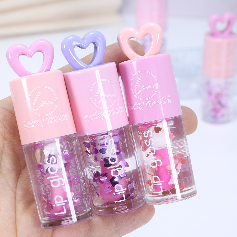 ML8013B Export [lucky model] Heart-shaped Sequin Color-changing Moisturizing Lip Oil MAGIC LIPOIL full figure
