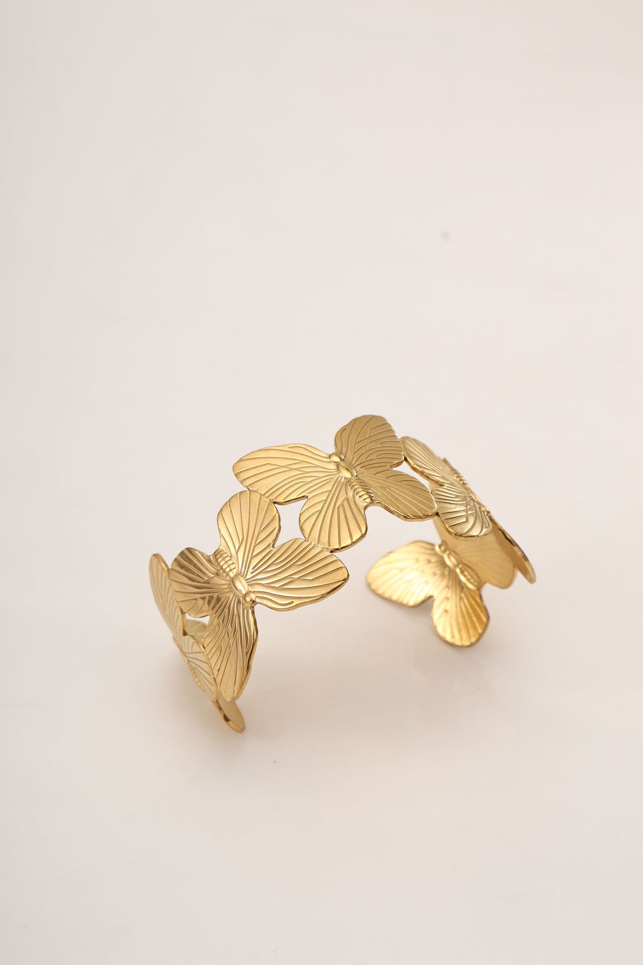 This titanium steel bracelet with a unique butterfly-shaped opening and adjustable design sense exudes a fashionable commuting and light luxury vibe, highlighting a white glove ring detail image 4