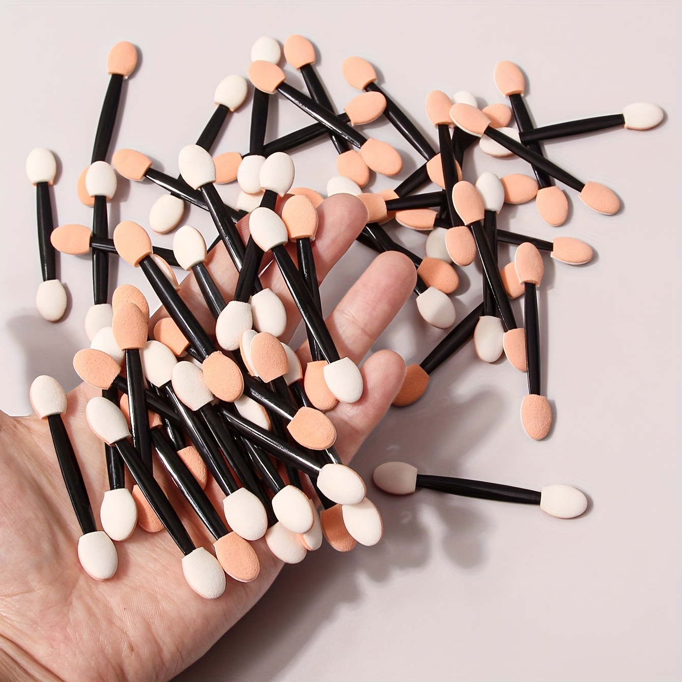 Wholesale of 50 double-headed sponge eyeshadow brushes, mini portable eyeshadow palettes, sponge sticks, eye smuders, and beauty tools details Picture
