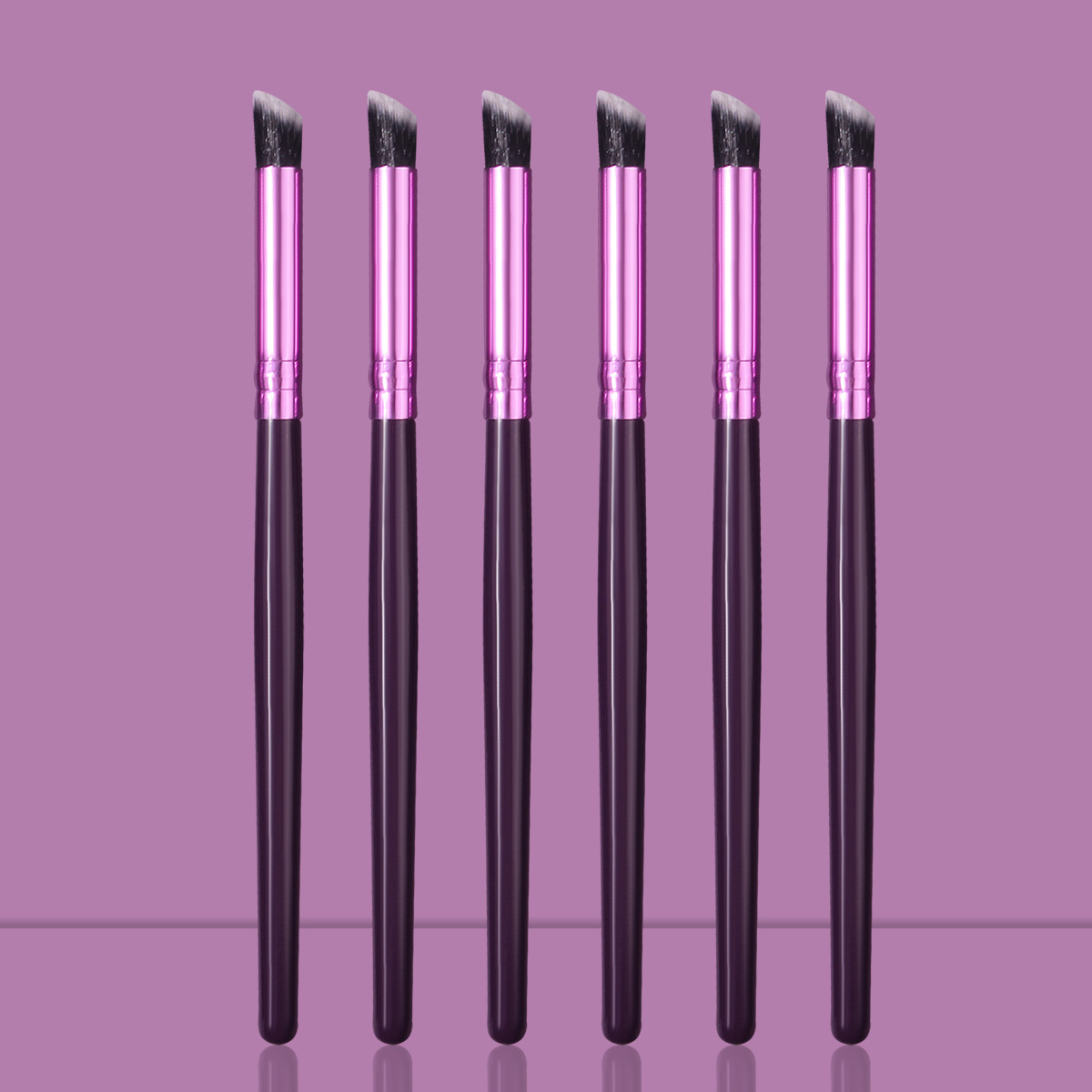 Purple wooden-handled eyeshadow brush, soft bristle concealer brush, angled eye smudging brush, highlight brush, beauty tools in stock for wholesale full figure