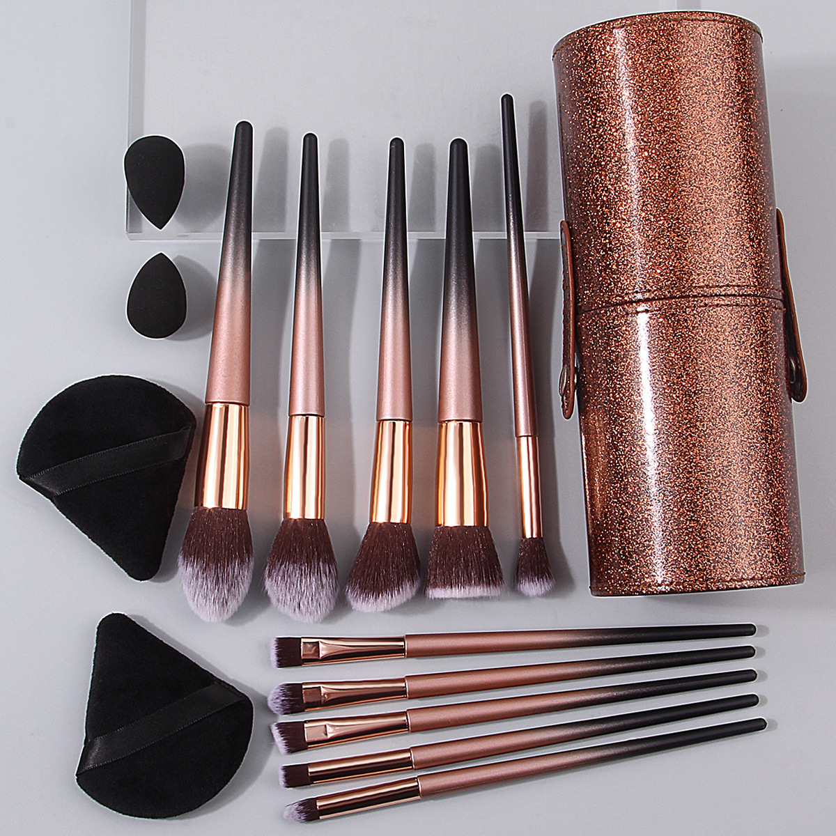 Black and Gold Gradient 10-piece makeup brush set in stock. Beauty tools: loose powder, blush brush, sponge, powder puff with storage bucket full figure