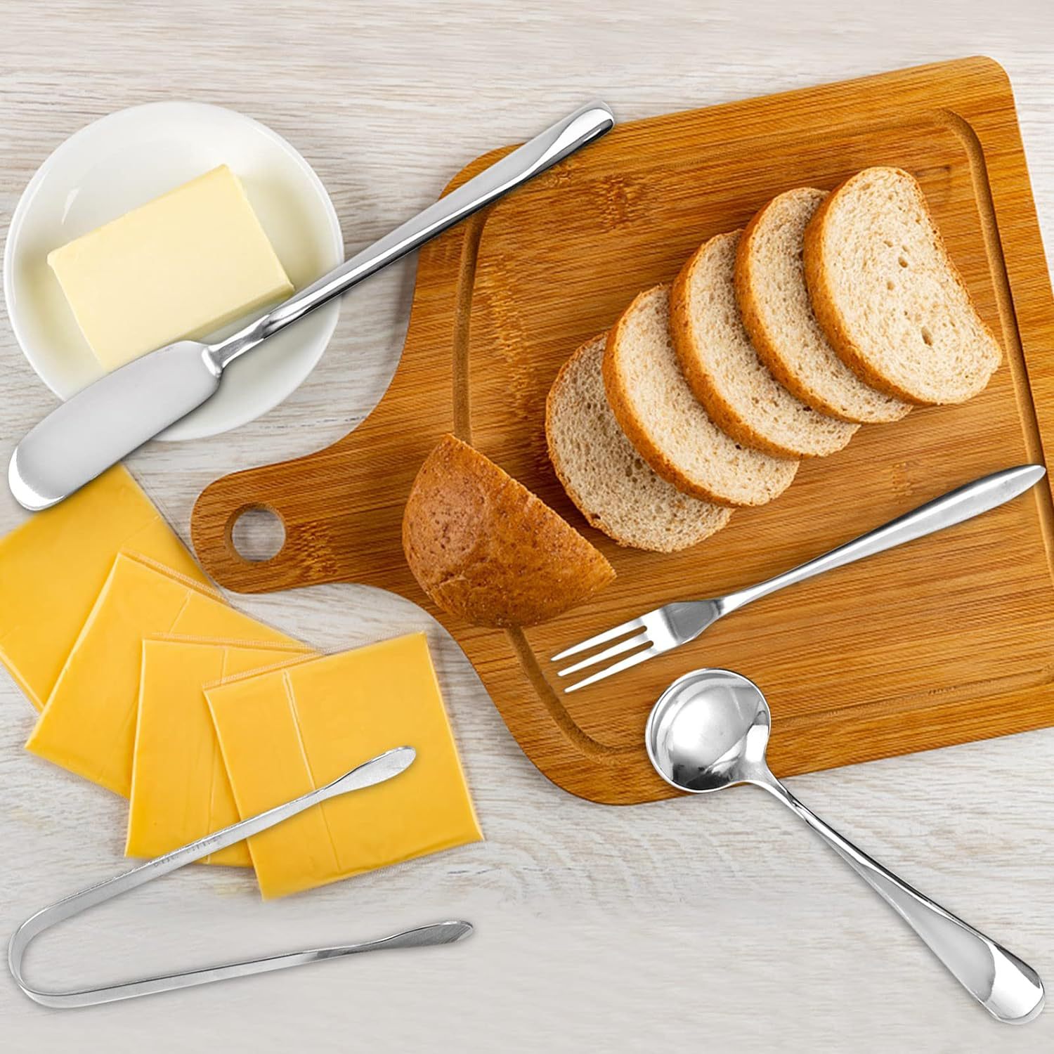 Amazon stainless steel cheese knife, butter spread knife, 14-piece set, butter knife, ice clip set, coffee spoon, sugar cube clip Application Scenario