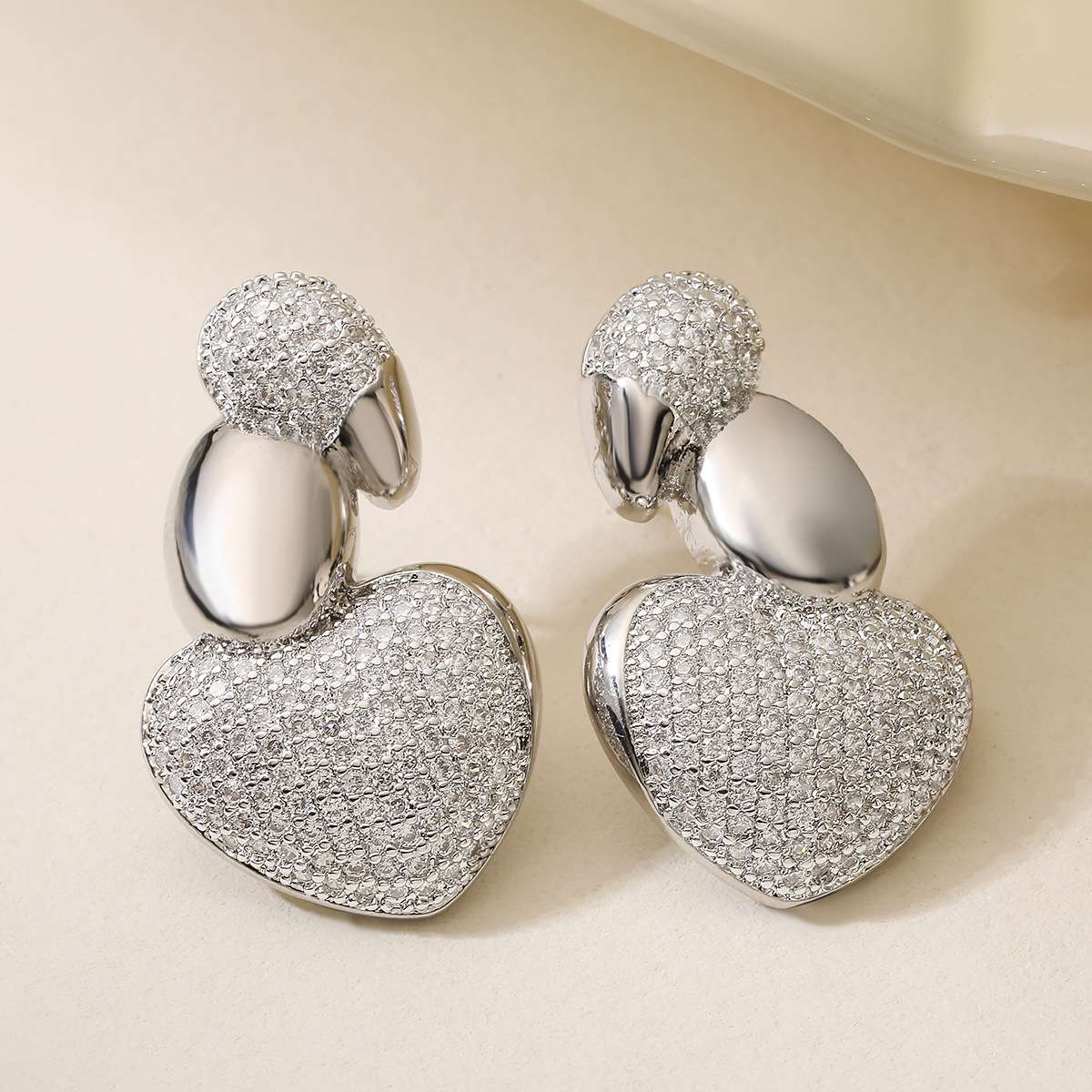 European and American cross-border fashion light luxury copper-plated 18K gold zircon irregular geometric ear studs, niche and personalized earrings detail image 2