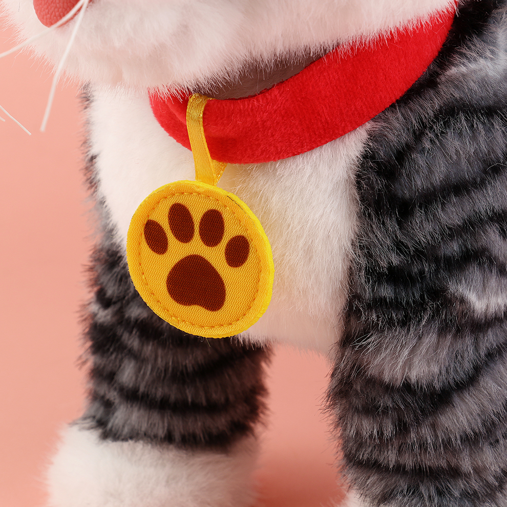 The striped electric plush kitten can sing before going to bed to soothe it. It records the goodnight voice message and is super well-behaved when it rubs against the pillow in a cute way Item Picture