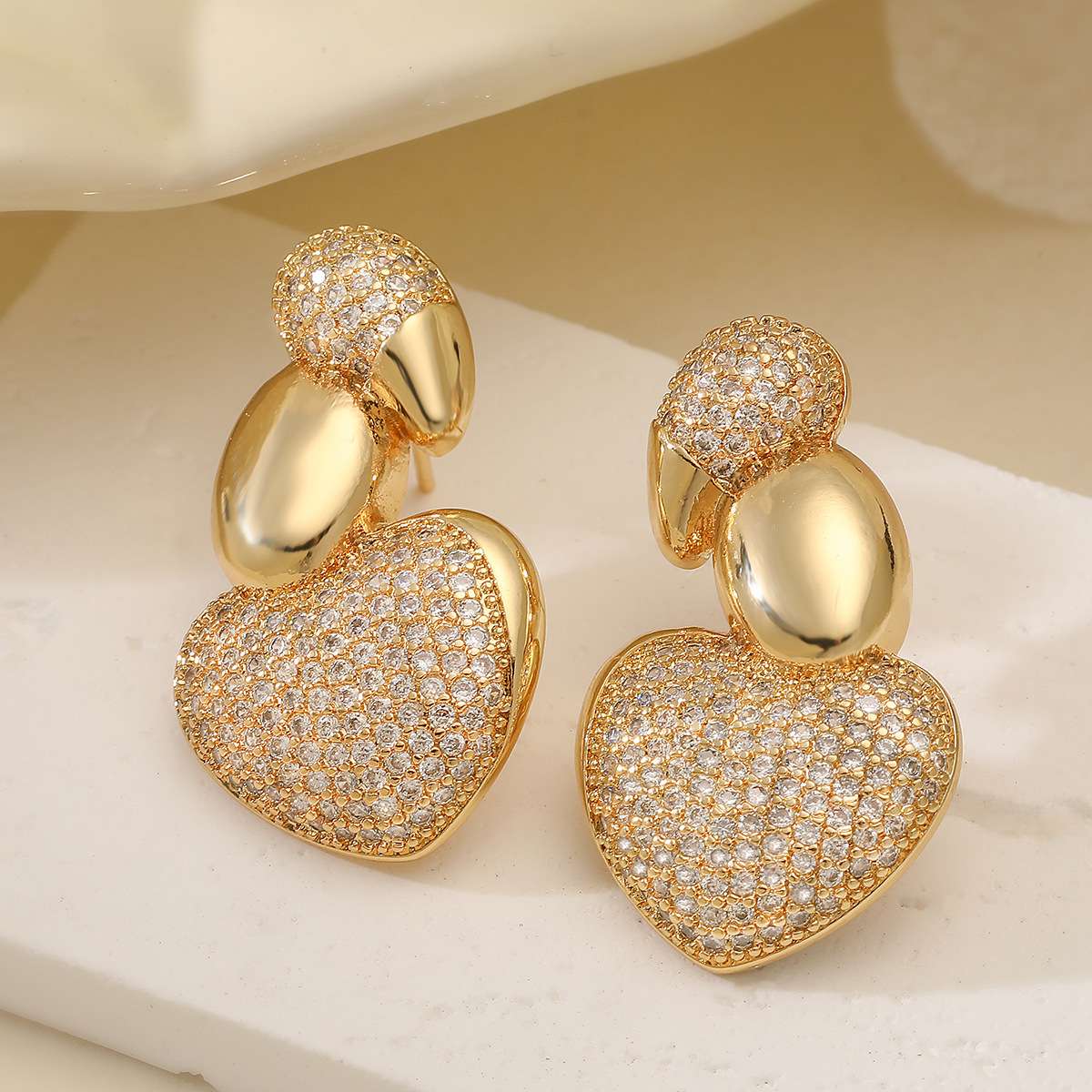 European and American cross-border fashion light luxury copper-plated 18K gold zircon irregular geometric ear studs, niche and personalized earrings