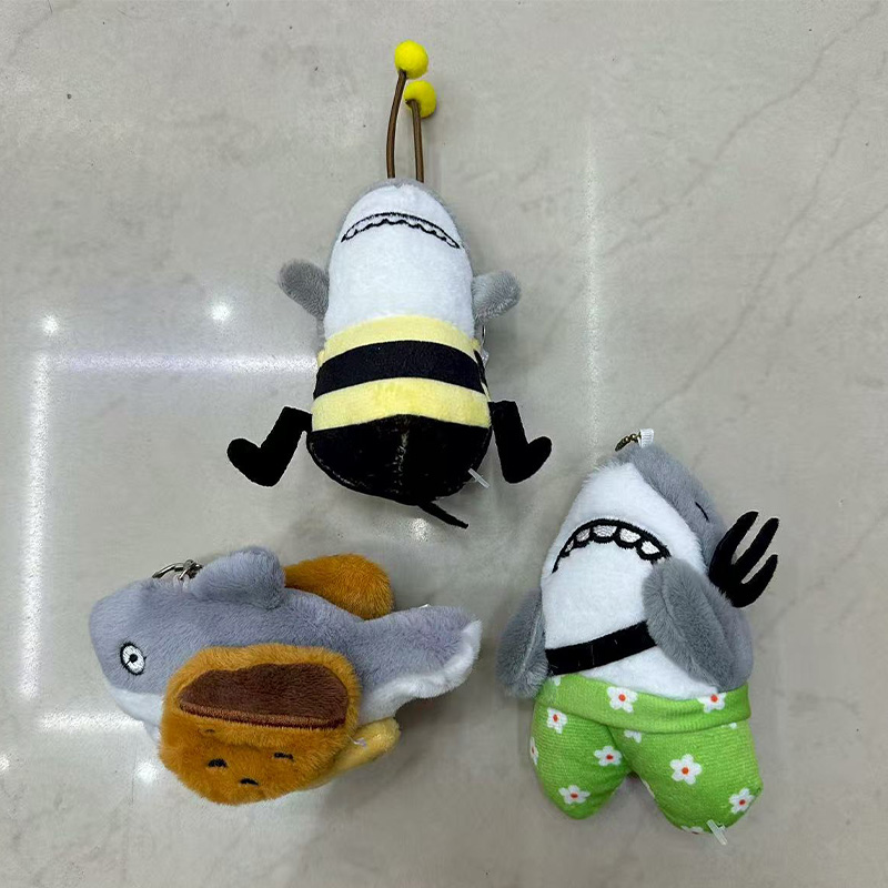 Shark carvings, shark honey, shark forks, parodies, plush toys, creative dolls, cartoon accessories, plush figurines, keychains, cloth dolls, cute decorations, gifts, claw machine factory direct sales details Picture