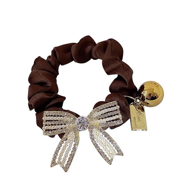 Wholesale of the 2025 new high-end pearl full diamond bow hair band, hair tie, hair bun, hair band and headwear Item Picture