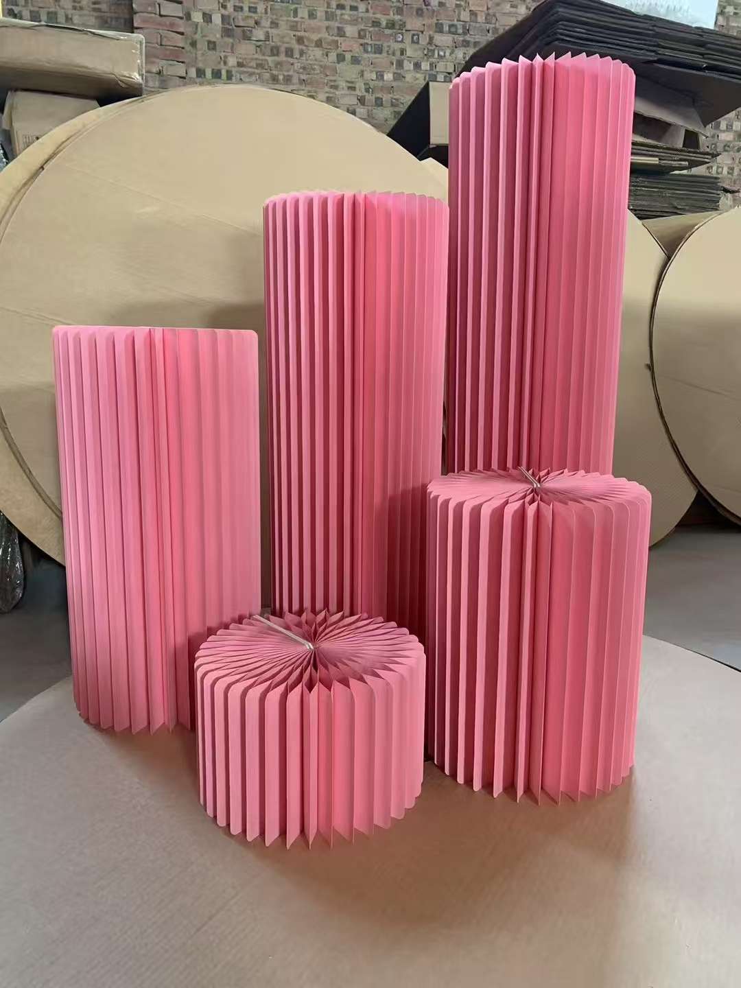 The creative clothing store features an island, a flowing water platform, display stands, cylindrical window display racks, display shelves, and balloon party tables that are densely packed details Picture