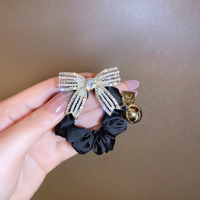 Wholesale of the 2025 new high-end pearl full diamond bow hair band, hair tie, hair bun, hair band and headwear details Picture