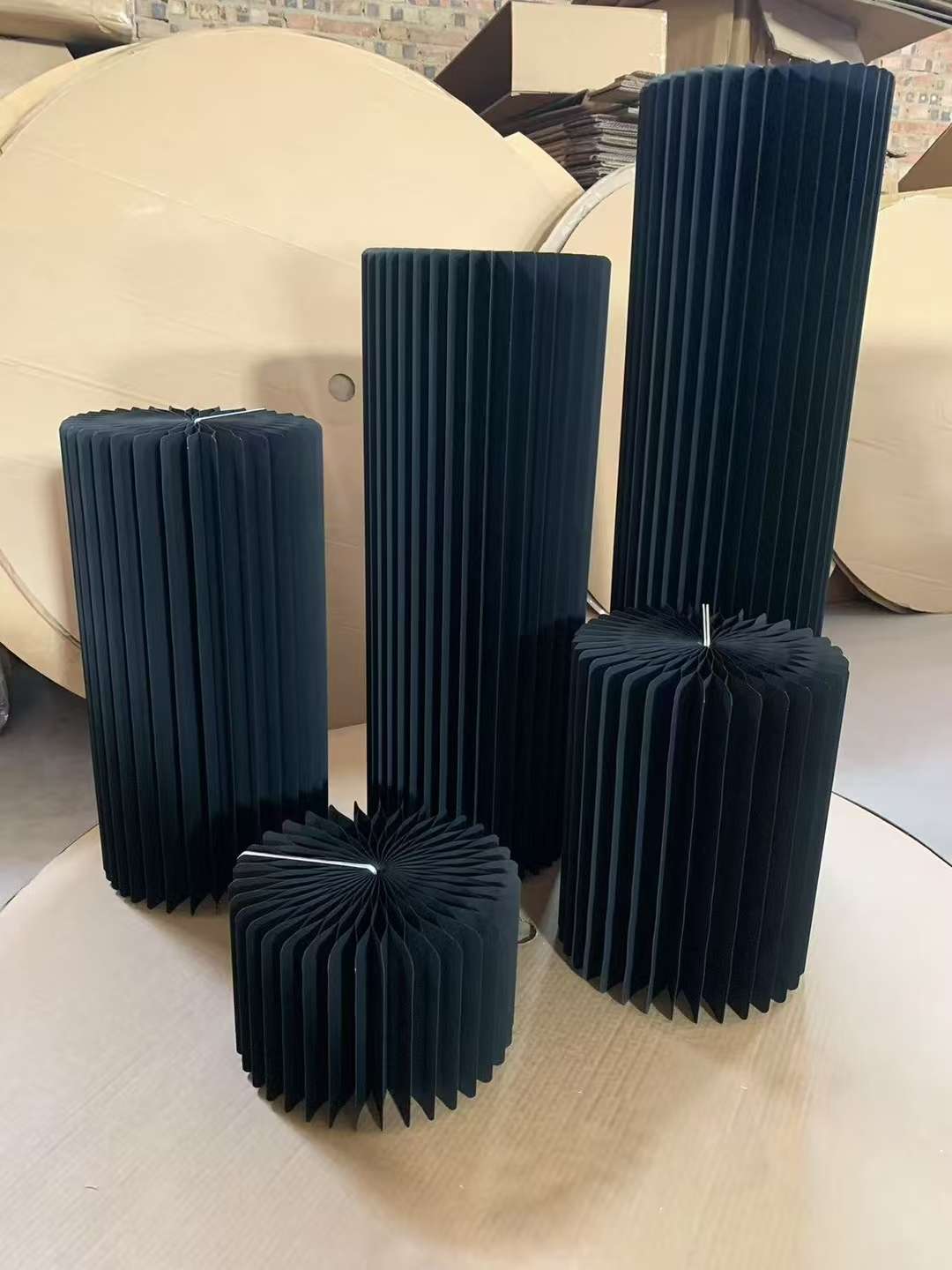 The creative clothing store features an island, a flowing water platform, display stands, cylindrical window display racks, display shelves, and balloon party tables that are densely packed Item Picture