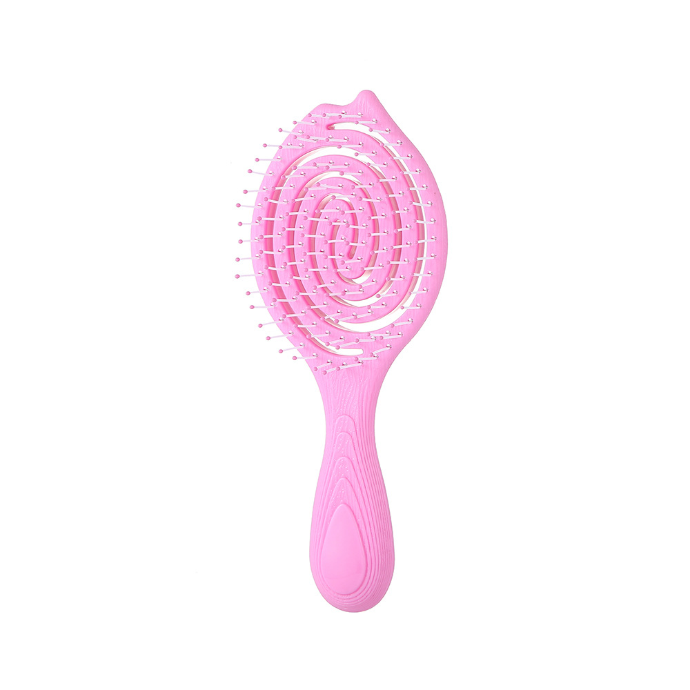 Wholesale of portable, practical and cute combs with a hollowed-out design on the head for massaging the scalp meridians details Picture