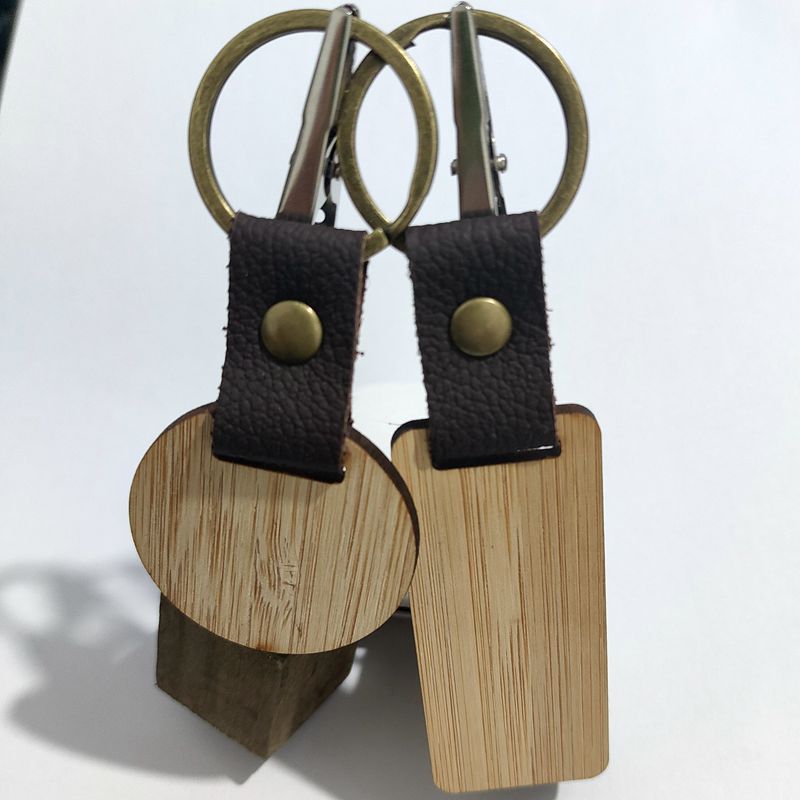 Factory direct sales Amazon best-selling wooden keychains: Black walnut keychains, vertical beech keychains, engraved with words Specification image