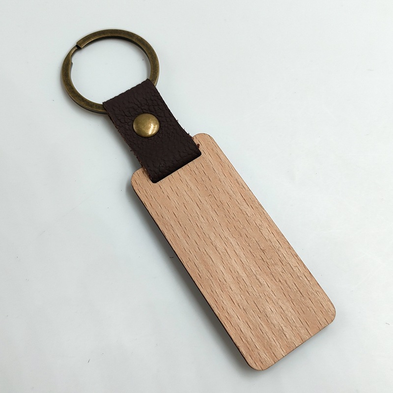 Factory direct sales Amazon best-selling wooden keychains: Black walnut keychains, vertical beech keychains, engraved with words Application Scenario