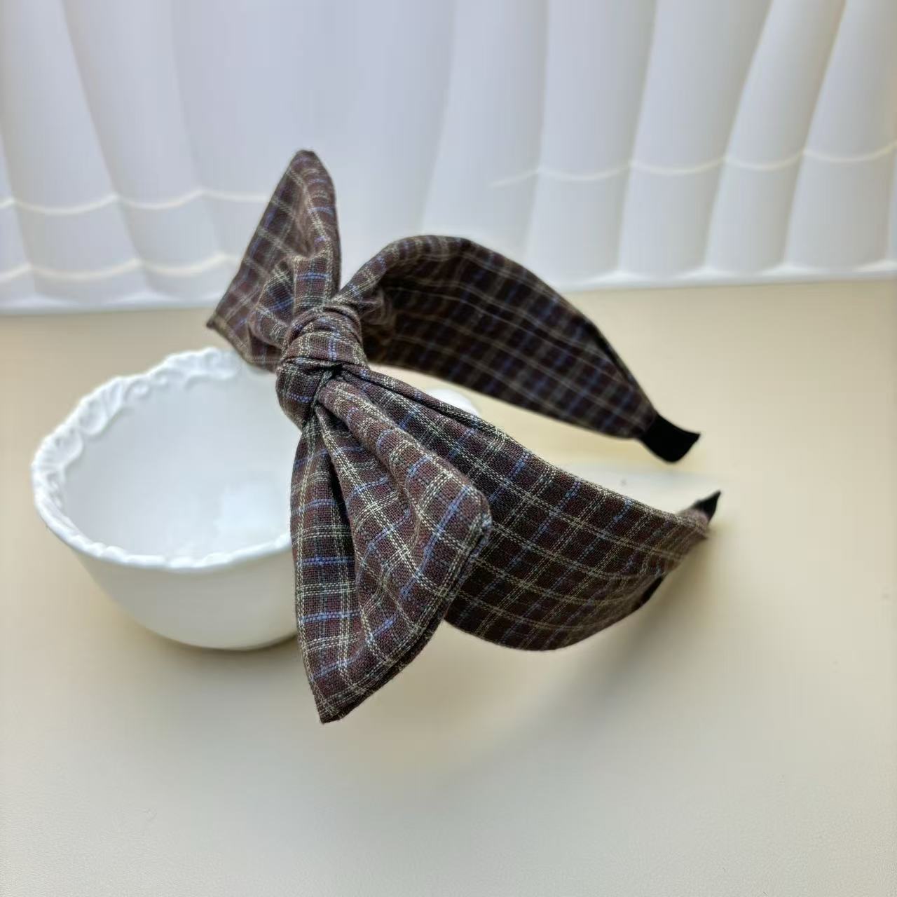 The new light luxury checkered rabbit ear headwear is a trendy and high-end headwear that goes well with all kinds of hair bands for women Application Scenario