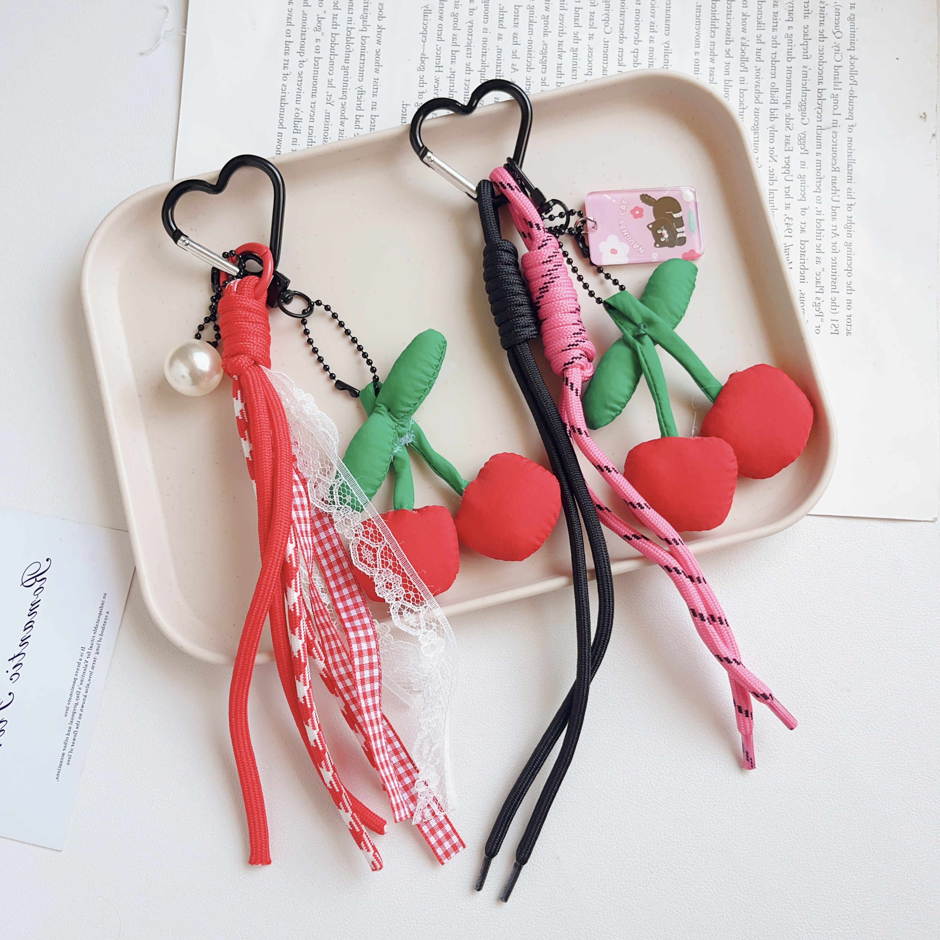 Cross-border y2k cute and niche design, unique fabric cherry hand-woven rope keychain bag, hanging suitcase for women Item Picture