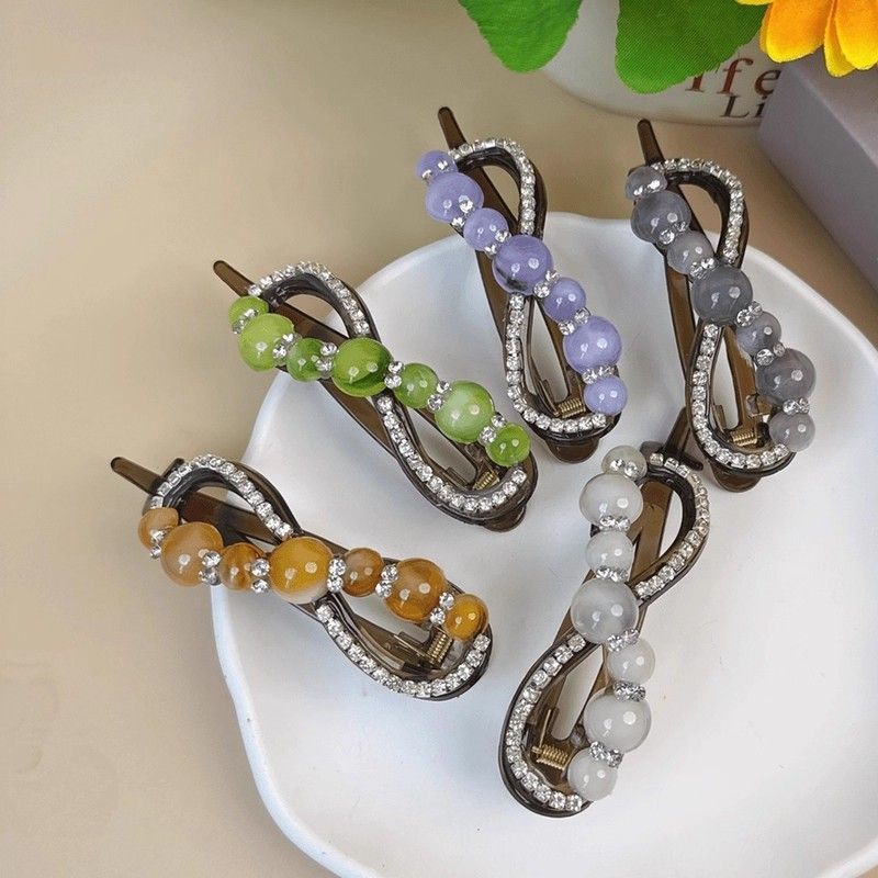 Best-selling pearl water diamond one-line twist hair clip 2025 new style clip at the back of the head, elegant and high-end hair clip and hair accessory